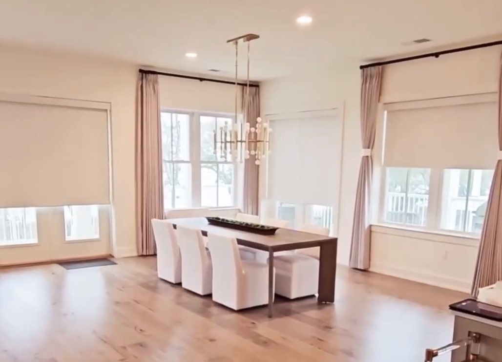 blackout shades rolling up in home using motorization